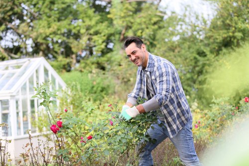Professional gardeners confirming a booking and service details